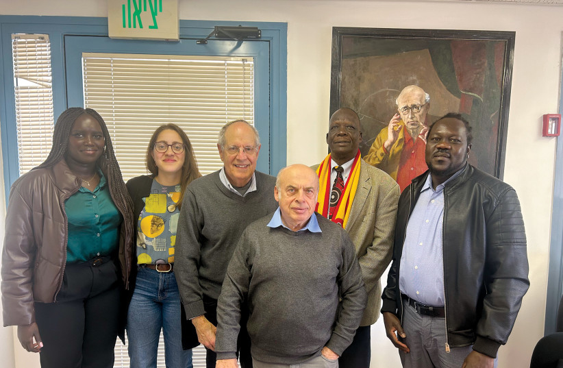  FROM LEFT: Naka Petia, a South Sudanese living in Israel, a staff member, Charles Jacobs, Natan Sharansky (center), Simon Deng, and the head of the South Sudanese Community in Israel, Abraham Joseph (credit: Simon Deng)