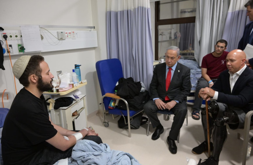   Prime Minister Netanyahu and Congressman Nast visited patients at Mount Scopus rehabilitation. (credit: PRIME MINISTER'S OFFICE)