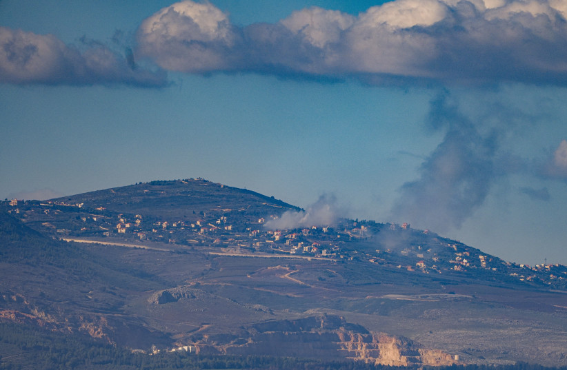  Smoke rises during an exchange of fire between the IDF and terrorists from the Hezbollah organization on the border between Israel and Lebanon, December 25, 2023 (credit:  Ayal Margolin/Flash90)