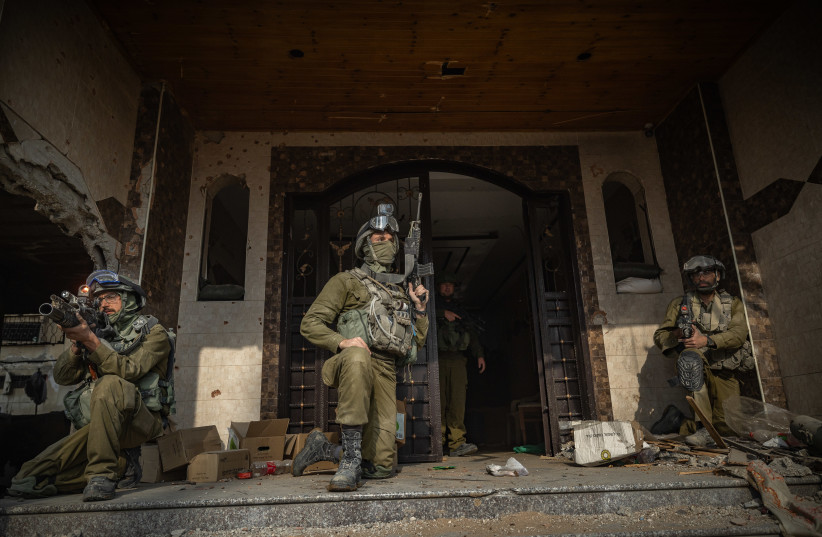  Israeli soldiers operating in Beit Lahia, in the northern Gaza Strip, December 28, 2023 (credit: YONATAN SINDEL/FLASH90)
