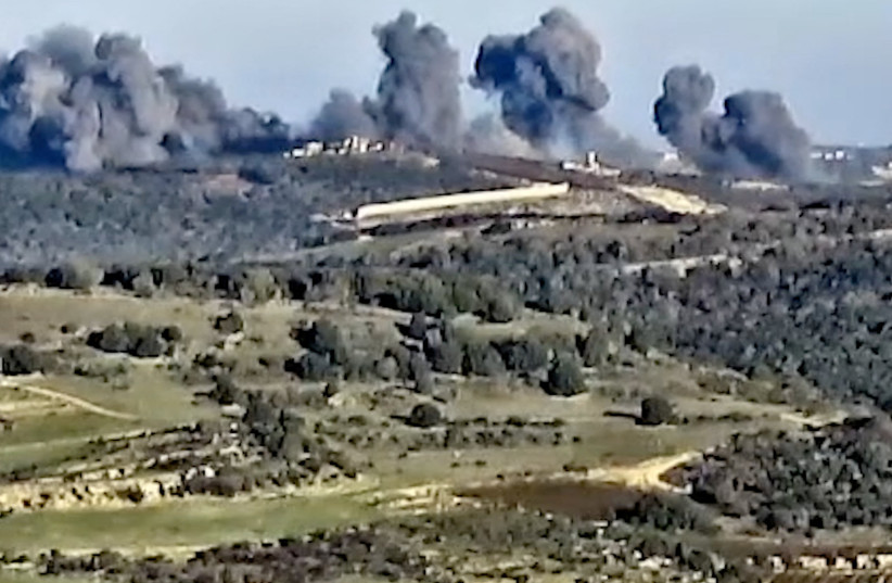  Smoke rises following what the Israeli military says is an Israeli strike on Hezbollah targets in a location given as Lebanon, amid the ongoing cross-border hostilities between Hezbollah and Israeli forces, in this screengrab taken from a handout video released on December 20, 2023. (credit:  ISRAEL DEFENSE FORCES/HANDOUT VIA REUTERS)