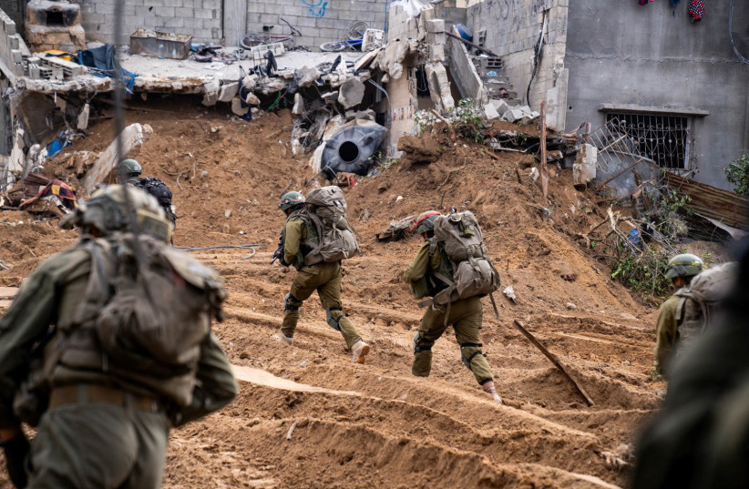 Israeli soldiers operate in the Gaza Strip on December 30, 2023 (credit: IDF SPOKESPERSON'S UNIT)