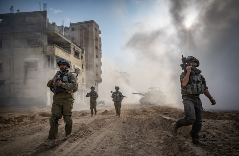 Israeli soldiers from the 8717 Battalion of the Givati Brigade operating in Beit Lahia, in the northern Gaza Strip, during an Israeli military operation in the Gaza Strip, December 28, 2023