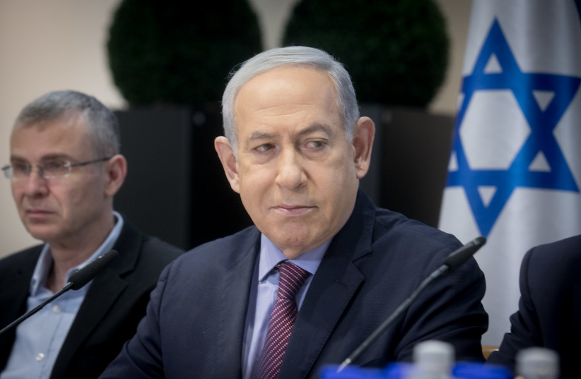  Prime Minister Benjamin Netanyahu leads a government conference at Hakirya base in Tel Aviv on December 31, 2023 (credit: MIRIAM ALSTER/FLASH90)