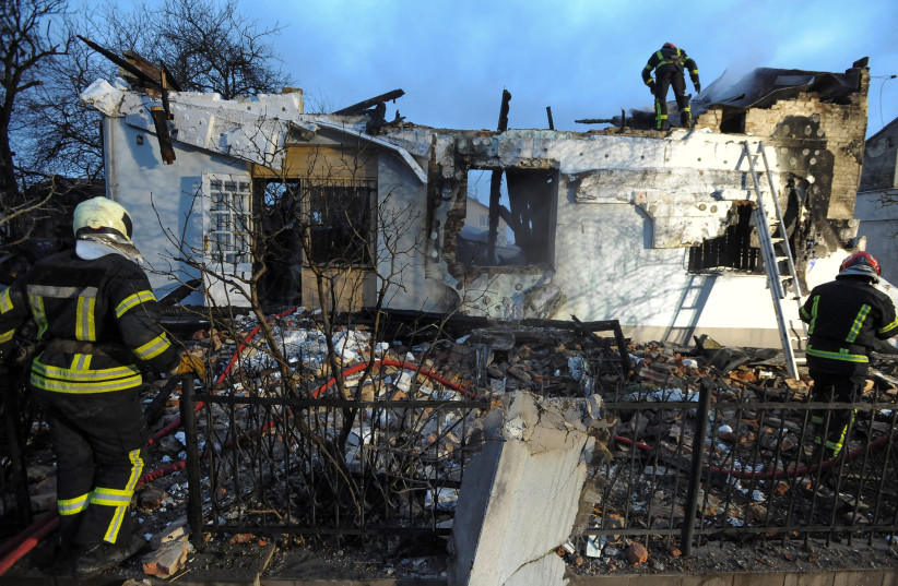 Firefighters work at the site of a museum dedicated to Roman Shukhevych, leader of the Ukrainian Insurgent Army (UPA), which was destroyed by a Russian drone strike, amid Russia's attack on Ukraine, in Lviv, Ukraine January 1, 2024.