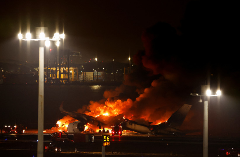  Japan Airlines' A350 airplane is on fire at Haneda international airport in Tokyo, Japan January 2, 2024. (credit: REUTERS/ISSEI KATO)