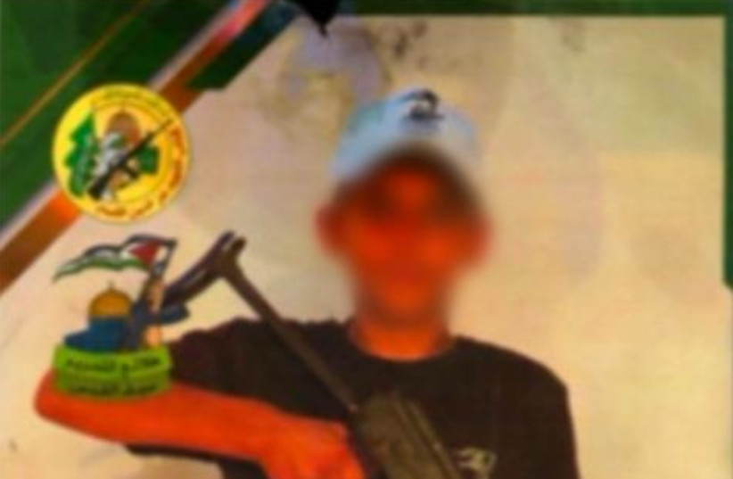 Membership card of a child with the Izz ad-Din al-Qassam Brigades logo in the top left, January, 2024  (credit: IDF SPOKESPERSON'S UNIT)