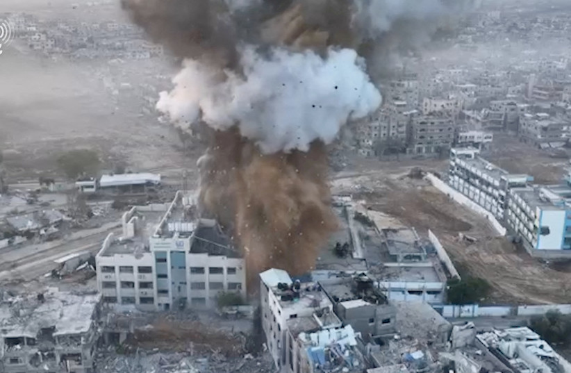  An explosion takes place in what Israel military said was a tunnel at AI Shifa Hospital ,November 24, 2023 (credit: IDF/Handout via REUTERS)