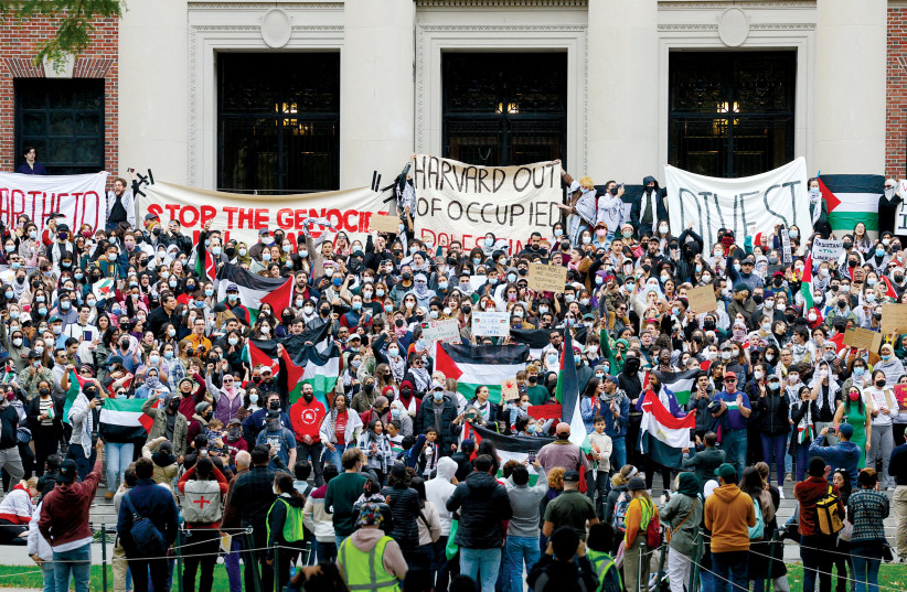  Demonstrators take part in an Emergency Rally: Stand with Palestinians Under Siege in Gaza at Harvard University on October 14, 2023. (credit: BRIAN SNYDER/REUTERS)