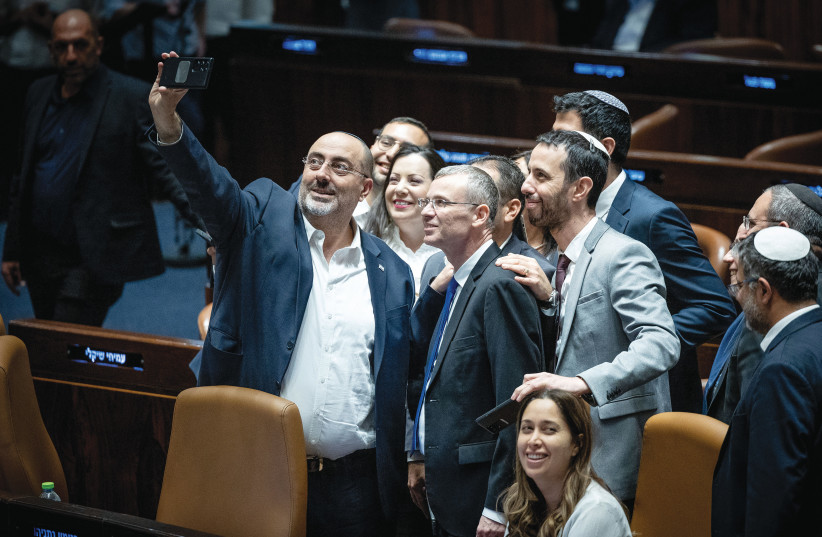  JUSTICE MINISTER Yariv Levin and coalition members celebrate the vote on the reasonableness bill in Knesset, last July. (credit: YONATAN SINDEL/FLASH90)