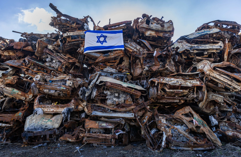  View of cars destroyed by Hamas terrorists during the October 7 massacre, at a field near the Israel-Gaza border, January 4, 2024 (credit: Chaim Goldberg/Flash90)