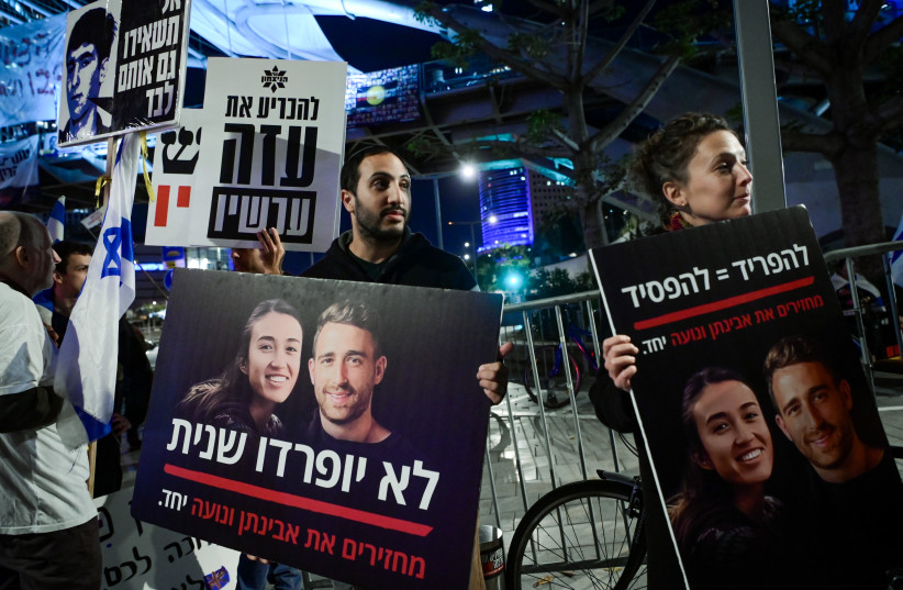  People protest calling for the government to find a solution to have the hostages released, outside Hakirya Base (Military Defense Headquarters) in Tel Aviv, January 4, 2024.  (credit: AVSHALOM SASSONI/FLASH90)