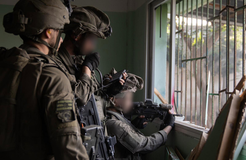 Israeli forces operate in the Gaza Strip on January 8, 2024  (credit: IDF SPOKESPERSON'S UNIT)