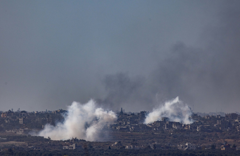  Smoke rises after an Israeli air strike in the Gaza Strip, as it seen from the Israeli side of the border, on January 7, 2024.  (credit: FLASH90)