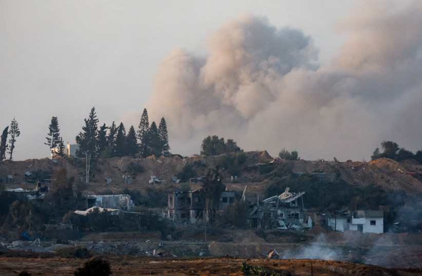 Smoke rises during an explosion in central Gaza, as seen from Israel's border with Gaza in southern Israel, January 9, 2024