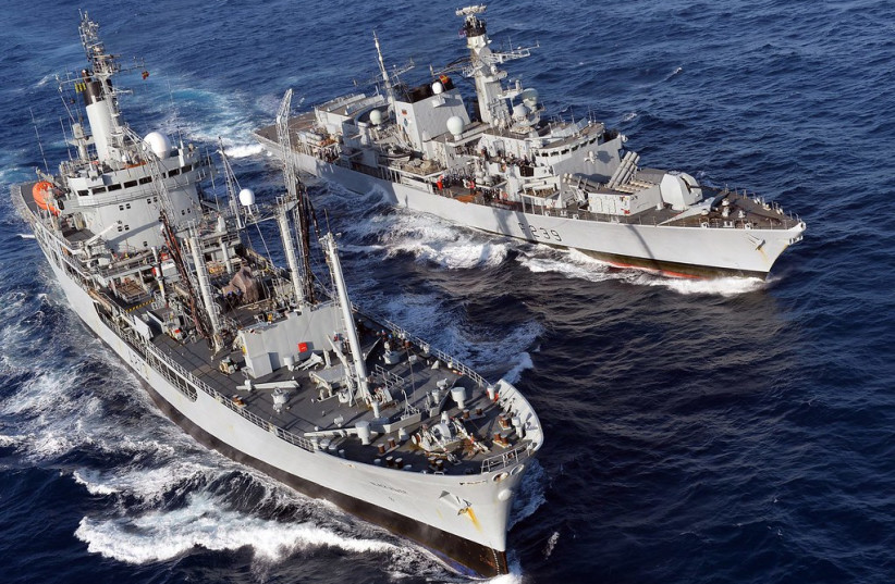  Type 23 frigate HMS Richmond (top) conducts a Replenishment at Sea (RAS) with RFA Black Rover. (credit: FLICKR)