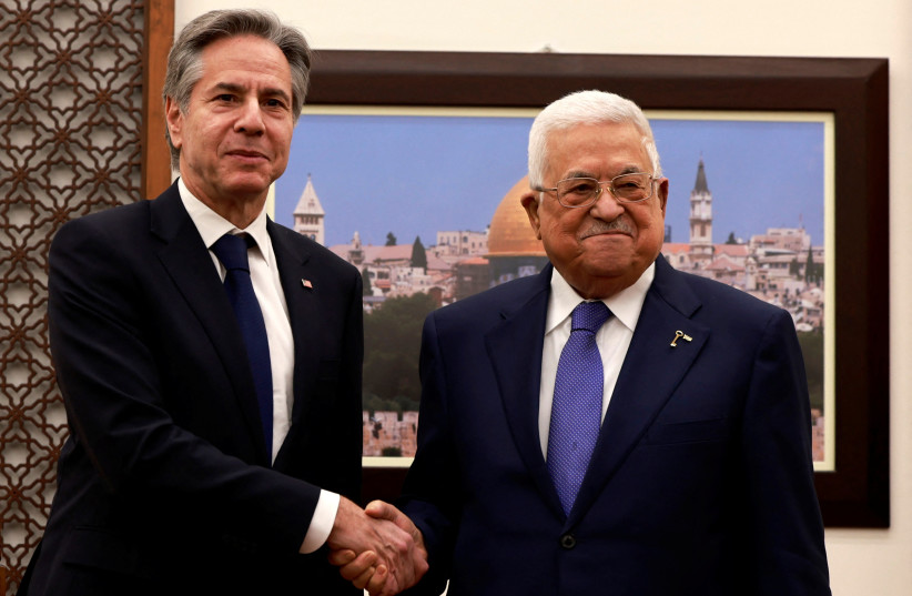 US Secretary of State Antony Blinken meets with Palestinian President Mahmoud Abbas, during his week-long trip aimed at calming tensions across the Middle East, in the Muqata'a, in Ramallah in the West Bank on January 10, 2024 (credit: JAAFAR ASHTIYEH/Pool via REUTERS)