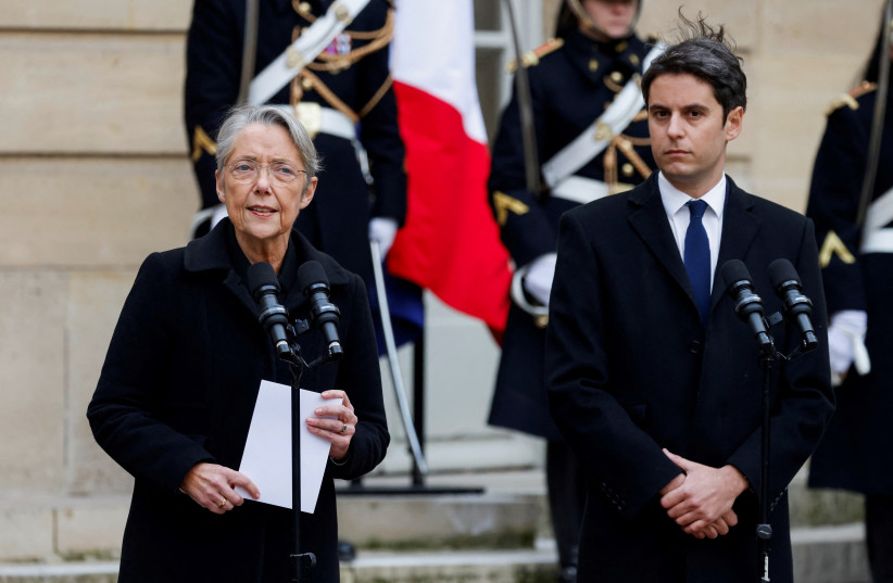  Outgoing Prime Minister Elisabeth Borne delivers a speech next to newly appointed Prime Minister Gabriel Attal during the handover ceremony at the Hotel Matignon in Paris, France January 9, 2024. (credit: LUDOVIC MARIN/POOL VIA REUTERS)