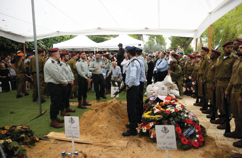  Mourning Moshe Yedidya Leiter at his Nov. 12 funeral on Mount Herzl (credit: FLASH90)