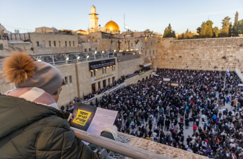  Jews pray for the army success in the war against Hamas, for the return of the Israeli hostages held by Hamas terrorists in Gaza and in memory of the people murdered in the October 7 massacre, at the Western Wall, Judaism's holiest prayer site in the Old City of Jerusalem, January 10, 2024.  (credit: Chaim Goldberg/Flash90)