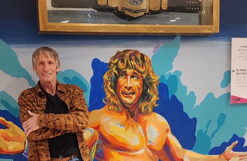  Kevin Von Erich at Dizengoff Center with his family’s world championship belt on display. (credit: ALEX KAPLAN)