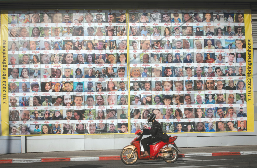  A BILLBOARD in Tel Aviv displays the photos of the hostages currently being held by Hamas in Gaza. (credit: MIRIAM ALSTER/FLASH90)