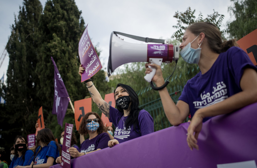 Members of the ''Standing Together'' movement protest for equal rights of financial support, outside the Israeli parliament on May 14, 2020. (credit: YONATAN SINDEL/FLASH90)