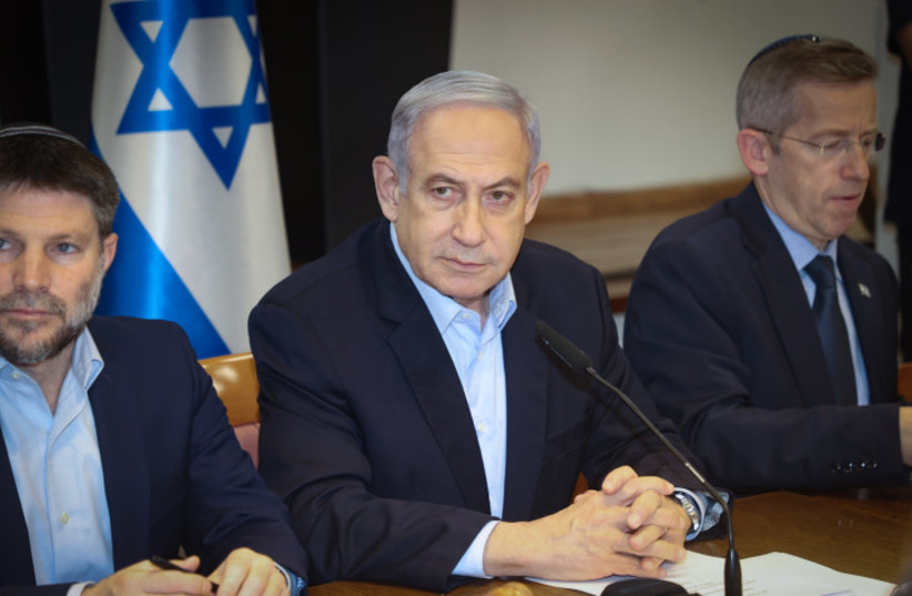  Israeli Prime Minister Benjamin Netanyahu leads a government conference at Hakirya base in Tel Aviv on January 7, 2024 (credit: YARIV KATZ /POOL)