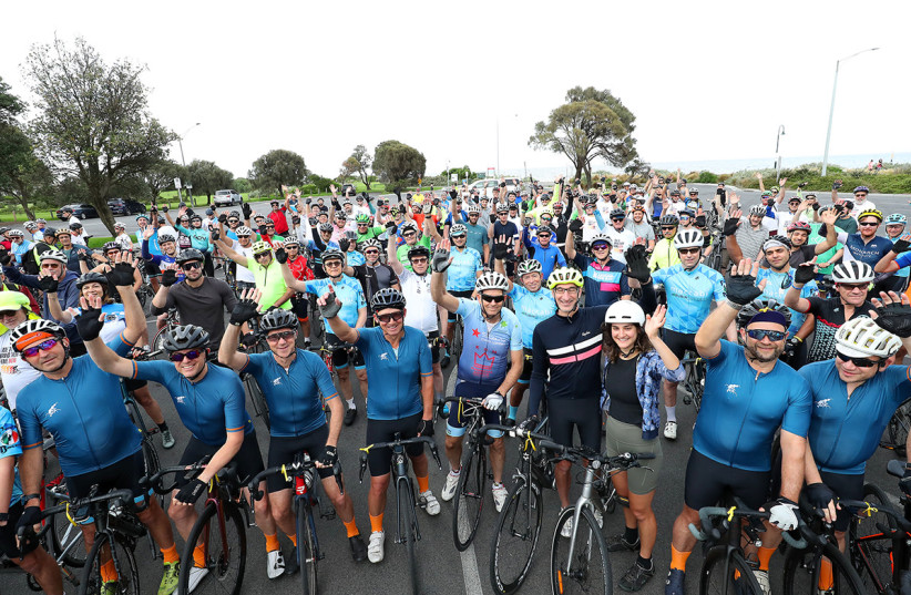 As part of the ''Ride To Bring Them Home Now'' cycling events, a global initiative commemorating the October 7 massacre, in Melbourne, Zionism Victoria organized rides and a rally attended by over 1,000 people. (credit: Zionism Victoria)