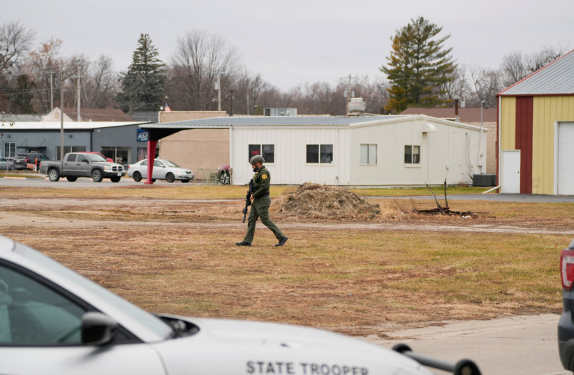  A police officer works at the scene of a school shooting at the Perry Middle School and High School in Perry, Iowa, U.S., January 4, 2024. (credit: REUTERS/Cheney Orr)