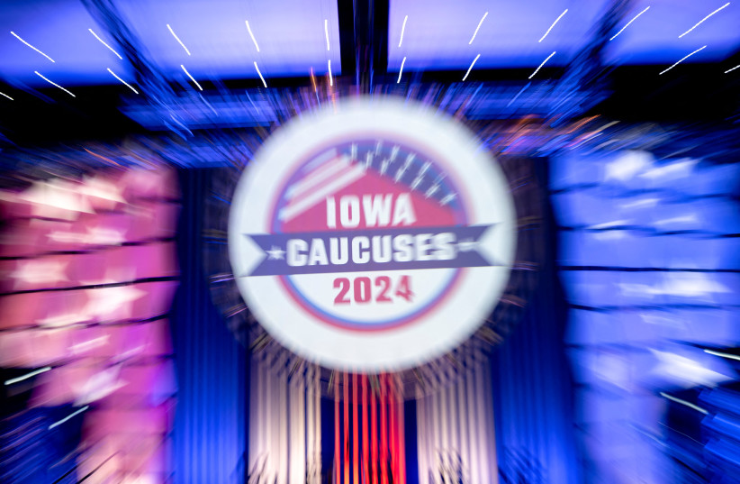  Signage for the 2024 Iowa Caucuses is seen taken with a long exposure at the Iowa Caucus media center at the Iowa Events Center ahead of the Iowa caucus vote in Des Moines, Iowa, U.S., January 14, 2024 (credit: REUTERS/Cheney Orr)