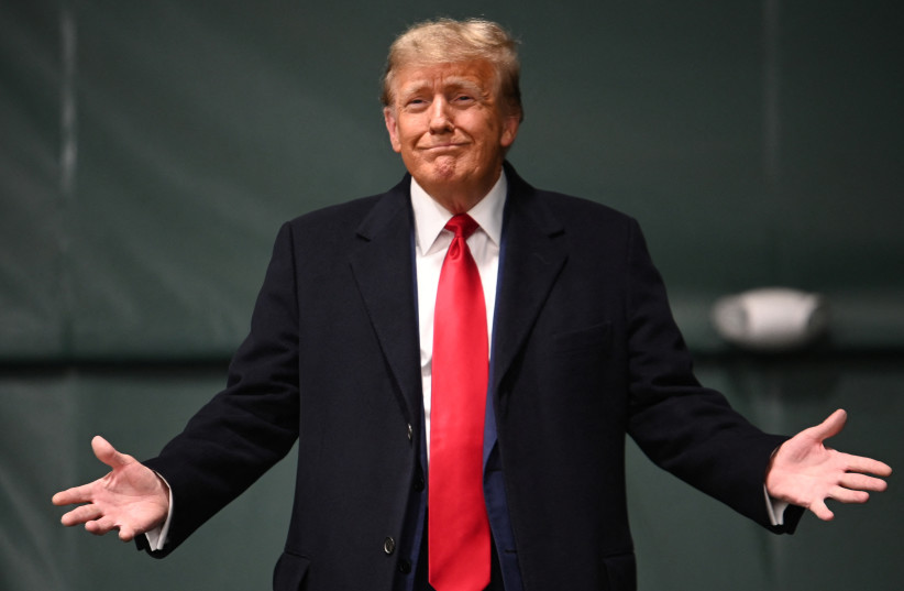 Republican presidential candidate and former U.S. President Donald Trump visits a caucus site at Horizon Event Center in Clive, Iowa, U.S. January 15, 2024.