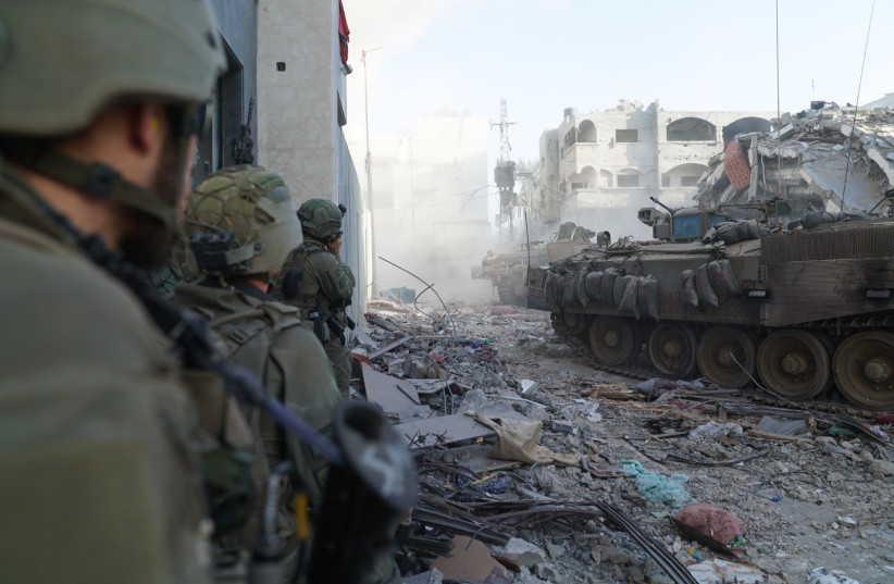 Israeli forces operate in the Gaza Strip, January 16, 2024 (credit: IDF SPOKESPERSON'S UNIT)