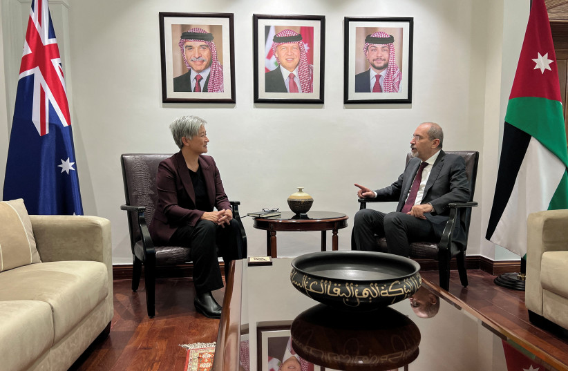 Jordanian Foreign Minister Ayman Safadi meets with Australian Foreign Minister Penny Wong in Amman, Jordan January 16, 2024.  (credit: REUTERS/JEHAD SHELBAK)