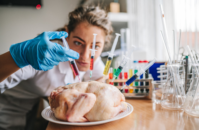  Scientist genetically modifying chickens (credit: Flickr/Ivan Radic)