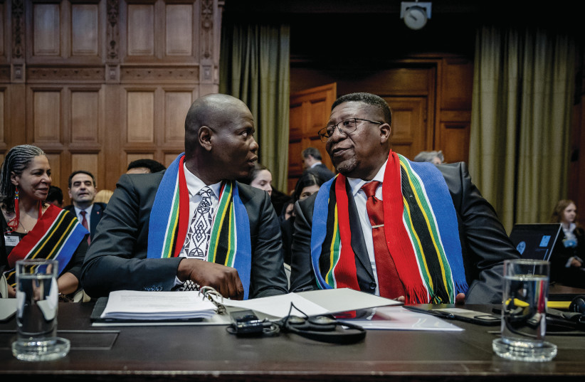  SOUTH AFRICAN Minister of Justice Ronald Lamola (L) and Ambassador to the Netherlands Vusimuzi Madonsela attend the ICJ ahead of the case against Israel, in The Hague, Jan. 11. (credit: Remko De Waal/ANP/AFP via Getty Images)