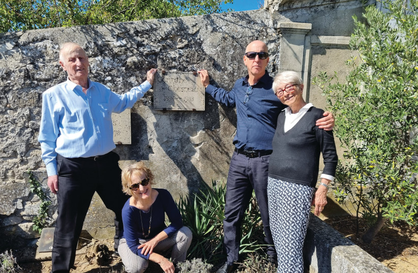  REMEMBRANCE AMBASSADORS In First Person founder Dudi Ronen with his father, Pinchas, his sister Racheli Merchav (crouching), and Chesnau's daughter Marianne, at Chesnau's grave. (credit: DUDI RONEN)