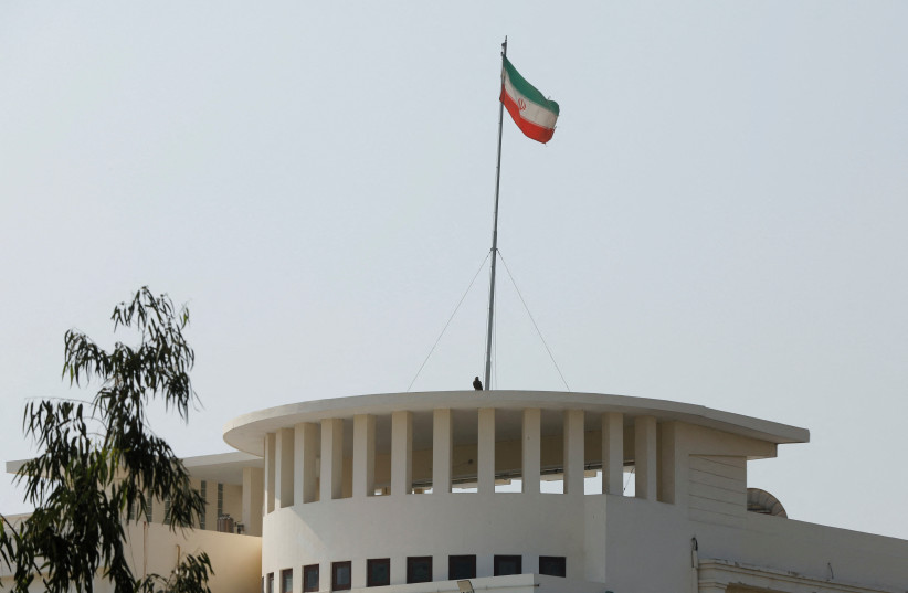  The flag of Iran is seen over its consulate building, after the Pakistani foreign ministry said the country conducted strikes inside Iran targeting separatist militants, two days after Tehran said it attacked Israel-linked militant bases inside Pakistani territory, in Karachi, Pakistan, 2024. (credit: REUTERS/AKHTAR SOOMRO)