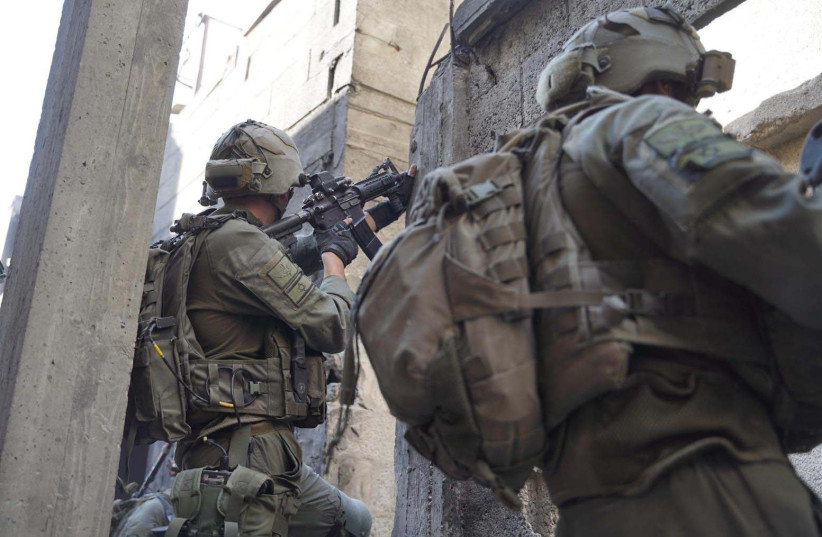  IDF troops operate in the Gaza Strip, January 22, 2024 (credit: IDF SPOKESPERSON'S UNIT)