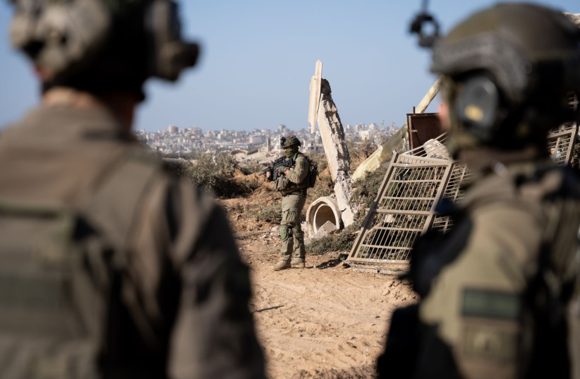  IDF troops are seen operating in the Gaza Strip. January 22, 2024. (credit: IDF SPOKESPERSON'S UNIT)