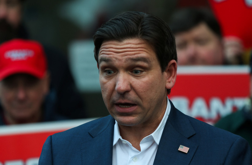  Republican presidential candidate and Florida Governor Ron DeSantis speaks to members of the press during a campaign visit ahead of the New Hampshire primary election at Saint Anselm College in Goffstown, New Hampshire, U.S. January 19, 2024. (credit: Reuters/Reba Saldanha)