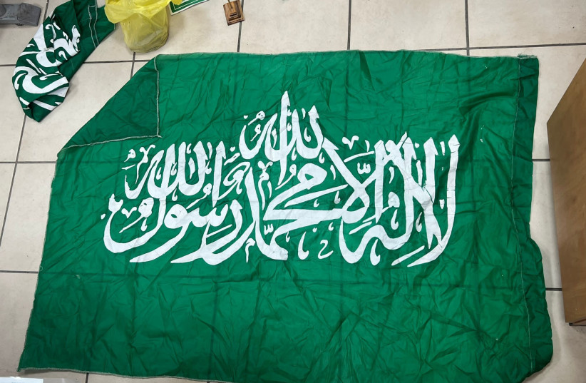 A Hamas flag found in one of the terrorists' houses.  (credit: POLICE SPOKESPERSON'S UNIT)