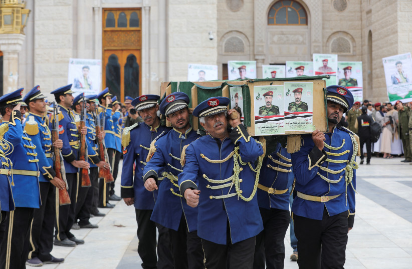  Honor guards carry the coffin of a Houthi fighter during a military funeral procession in Sanaa, Yemen January 20, 2024. (credit: KHALED ABDULLAH/REUTERS)