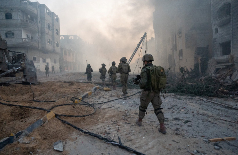  Israeli soldiers operate in the Gaza Strip amid the ongoing conflict between Israel and Hamas, January 21, 2024 (credit: IDF SPOKESPERSON'S UNIT)