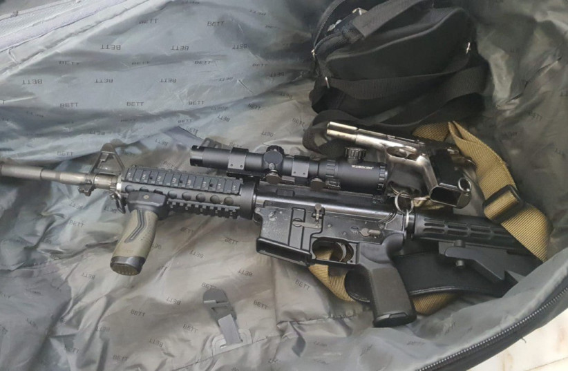  The M16 rifle found by the Police during the search on Tuesday.  (credit: POLICE SPOKESPERSON'S UNIT)