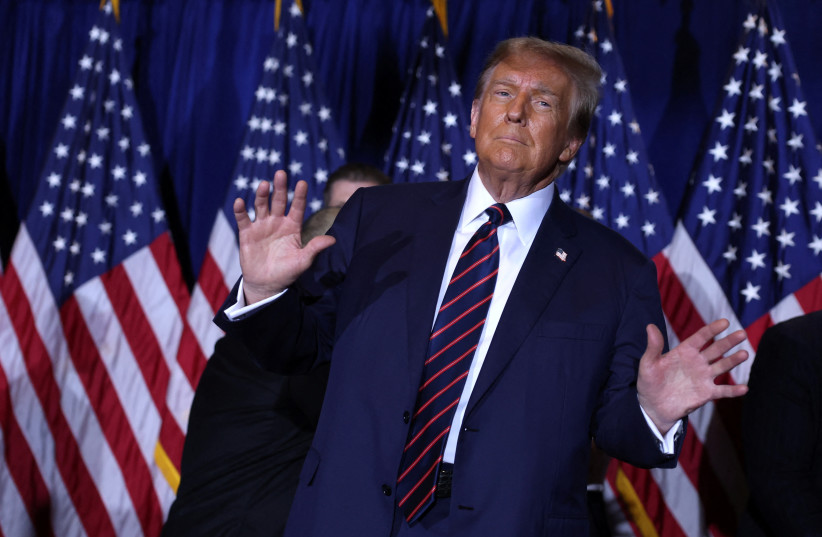  Former US President Donald Trump gestures in Nashua, New Hampshire, January 23, 2024 (credit: REUTERS/MIKE SEGAR)