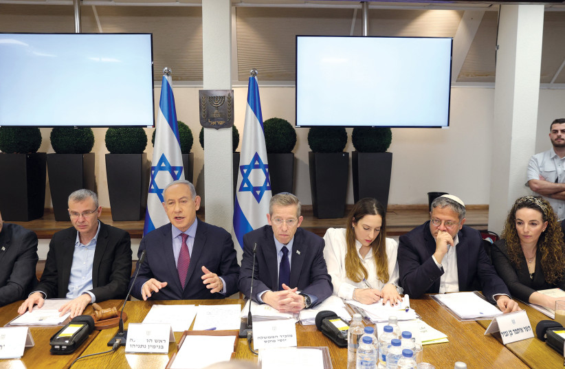  Prime Minister Benjamin Netanyahu addresses a cabinet meeting at the Kirya in Tel Aviv on December 31, 2023.  (credit: ABIR SULTAN / REUTERS)