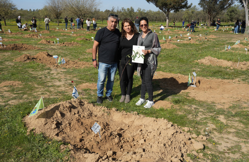  The families of October 7 Nova music festival victims participate in an tree-planting ceremony together with KKL-JNF at the Re’im Forest on January 21, 2024. (credit: Yossi Ifergan/KKL- JNF Photo Archive)