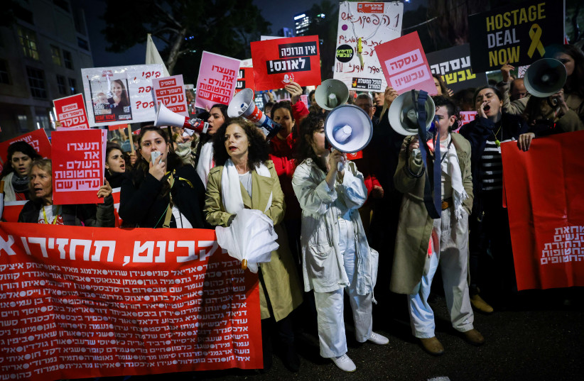  Israelis protest march calling for the release of Israeli hostages held by Hamas terrorists in Gaza, in Tel Aviv, January 24, 2024.  (credit: Chaim Goldberg/Flash90)