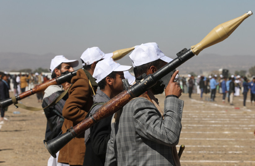  Armed Houthi followers hold RPG launchers as they take part in a parade during a protest to decry the U.S.-led strikes on Houthi targets and to show support to Palestinians in the Gaza Strip, amid the ongoing conflict between Israel and the Palestinian Islamist group Hamas, near Sanaa, Yemen Januar (credit: REUTERS/KHALED ABDULLAH)